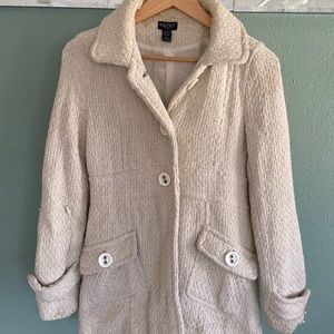 Cream colored tight knit pea coat